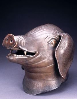 猪首铜像的经历